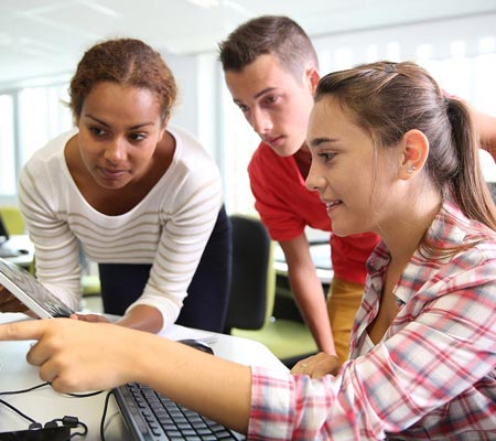 school kids working together